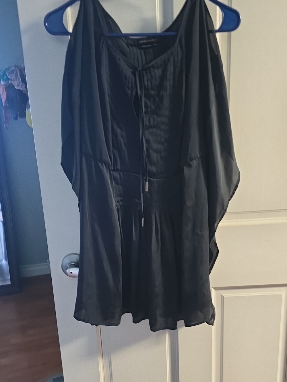 BCBGMaxAzria Black Sleeveless Peplum Tunic